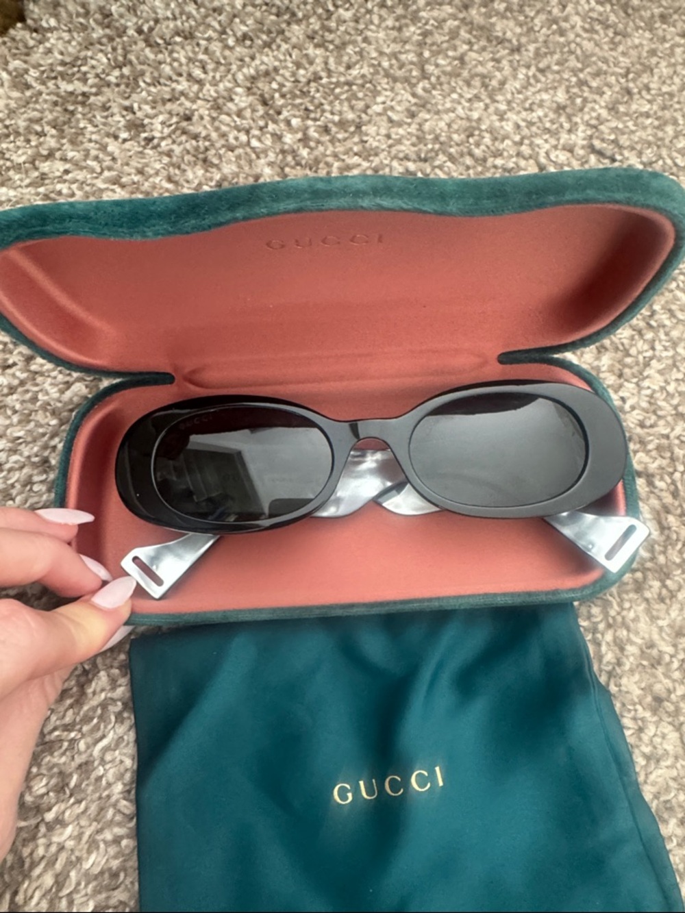 Gucci Black Oval Sunglasses with Silver Temples and Green Case